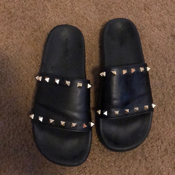 studded black slides
